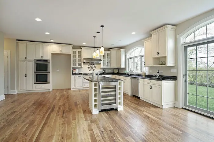 Modern kitchen with hardwood flooring